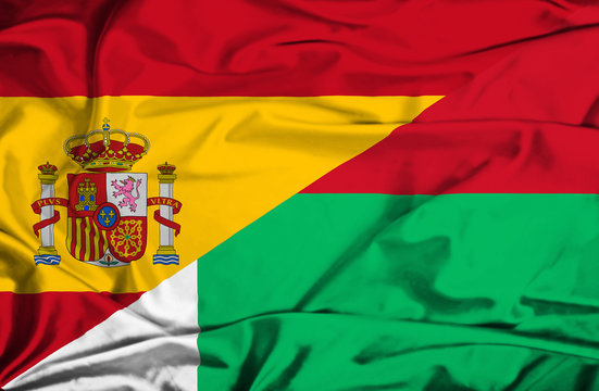 Waving flag of Madagascar and Spain