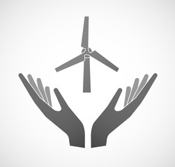 Two hands offering a wind generator