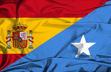 Waving flag of Somalia and Spain