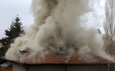 Burning house roof