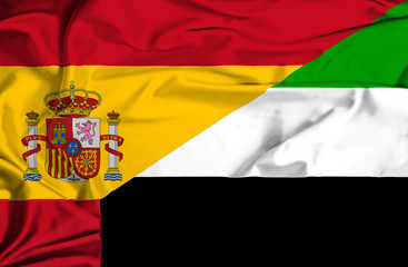 Waving flag of United Arab Emirates and Spain