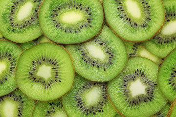 Background made from ripe kiwi slices