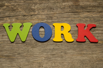 work text on a wooden background