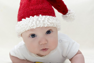 Small boy in knitted red hat