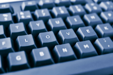 keys of a keyboard forming the word love