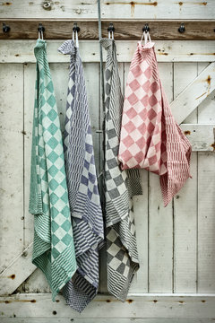 Retro styled image of hanging dish cloths