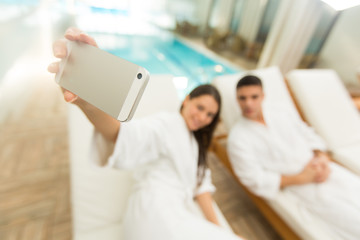 Young couple by the pool