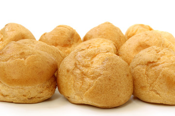 Profiteroles are laid in rows