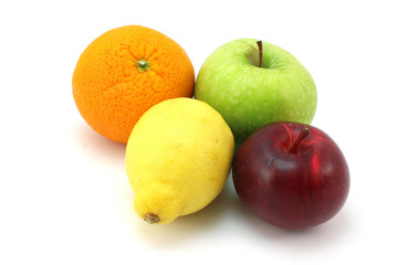 Two apples, lemon and orange