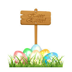 Easter eggs and wooden sign