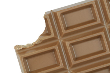 Bitten chocolate on white background
