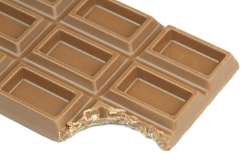Bitten chocolate on white background