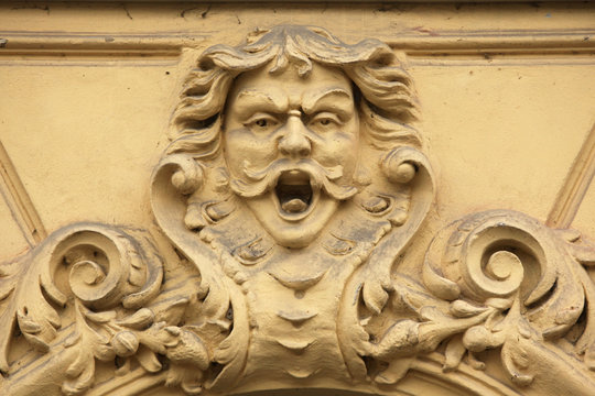 Funny mascaron on the Art Nouveau building