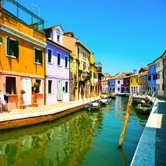 Obraz na płótnie Canvas Venice landmark, Burano island canal, colorful houses and boats,
