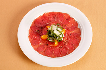 Meat Carpaccio with rocket.