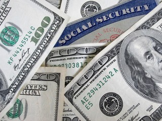 social security card buried in money