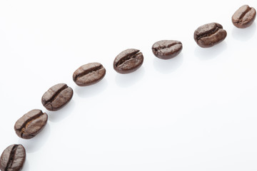 Dotted line of coffee beans