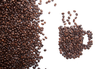 Roasted coffee beans in coffee mug shape