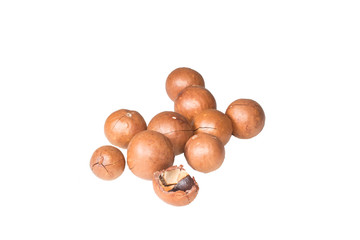 Shelled and unshelled macadamia nuts on white background