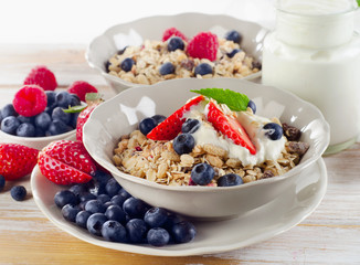 Healthy Breakfast with ripe fresh berries  and  muesli.