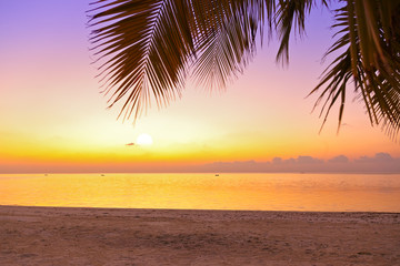 Naklejka na ściany i meble Sunset in Maldives beach