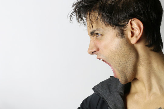 Portrait Of A Man Screaming In Rage