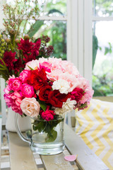 colorful rose in glass