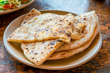 juicy delicious cakes with garlic and butter on a plate