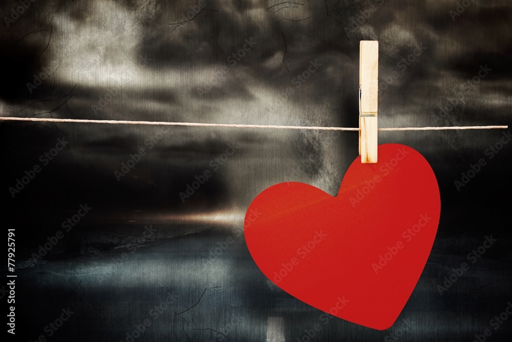 Poster composite image of heart hanging on line