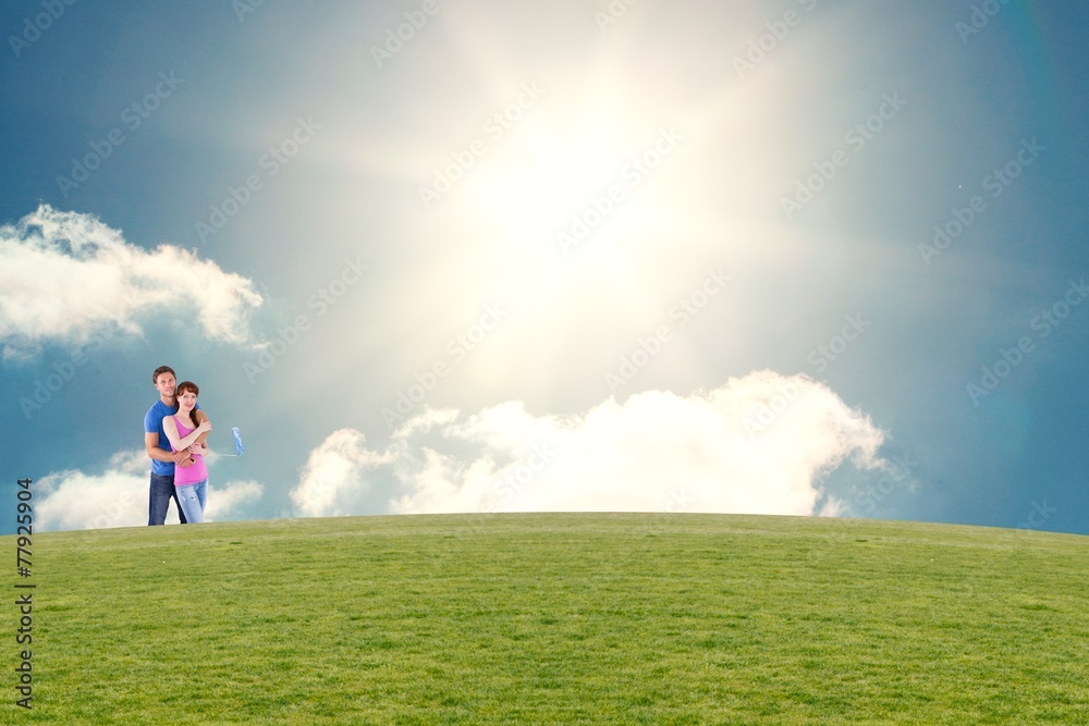 Poster composite image of couple hugging and holding brush