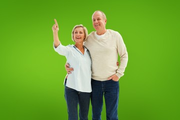 Composite image of happy mature couple walking together