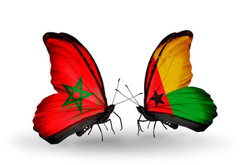 Two butterflies with flags Morocco and Guinea Bissau
