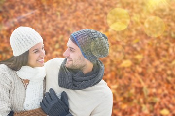 Fototapeta premium Composite image of young winter couple