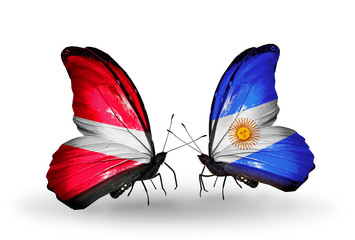 Two butterflies with flags Latvia and Argentina