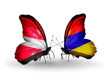 Two butterflies with flags Latvia and Armenia