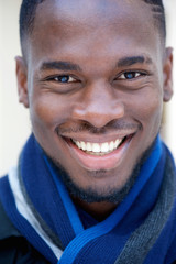 Happy young black man smiling