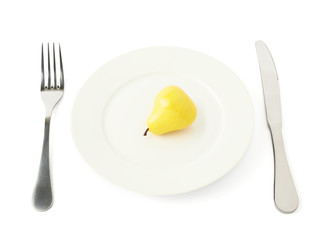 Pear fruit in a plate isolated