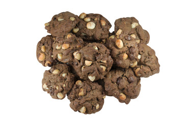 Pile of macadamia chocolate cookies isolated on white background