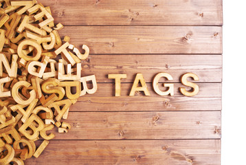 Word tags made with wooden letters
