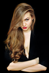 Fototapeta premium Beautiful young woman with on a black background