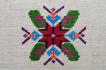 Ornament- ethnic Ukrainian embroidery on cannabic canvas