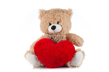 Teddy Bear Holding a Heart on white