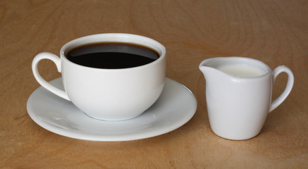 Obraz premium Coffee cup and milk jug