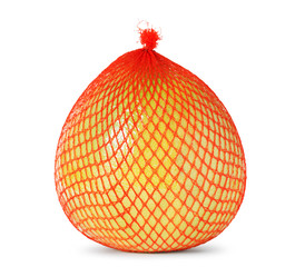 Yellow pomelo wrapped in plastic and mesh