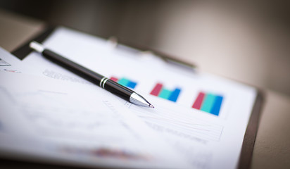 financial charts and graphs on the table
