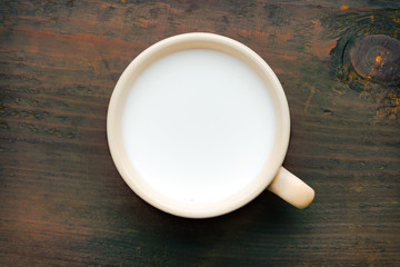 Ceramic cup with milk - 77941153