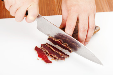cutting the dried beef