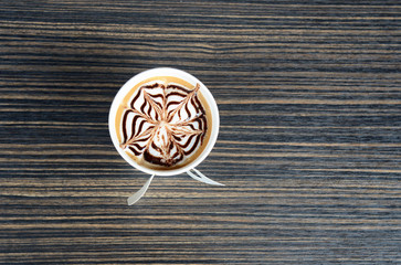Hot coffee Latte art  in paper cup