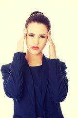 Young woman suffering a headache