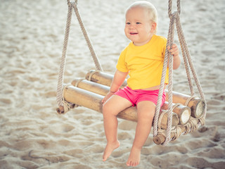 Baby on a swing